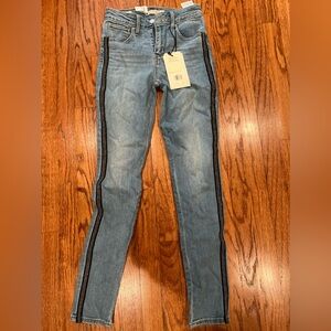 Levi’s skinny high rise.  Side strip. New with tags.